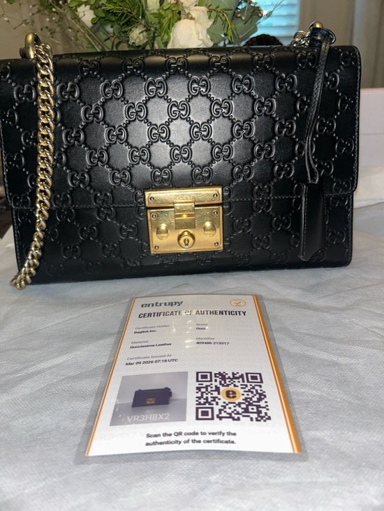 Gucci Handbags - Gucci Black Embossed GG Leather Crossbody with Gold Lock